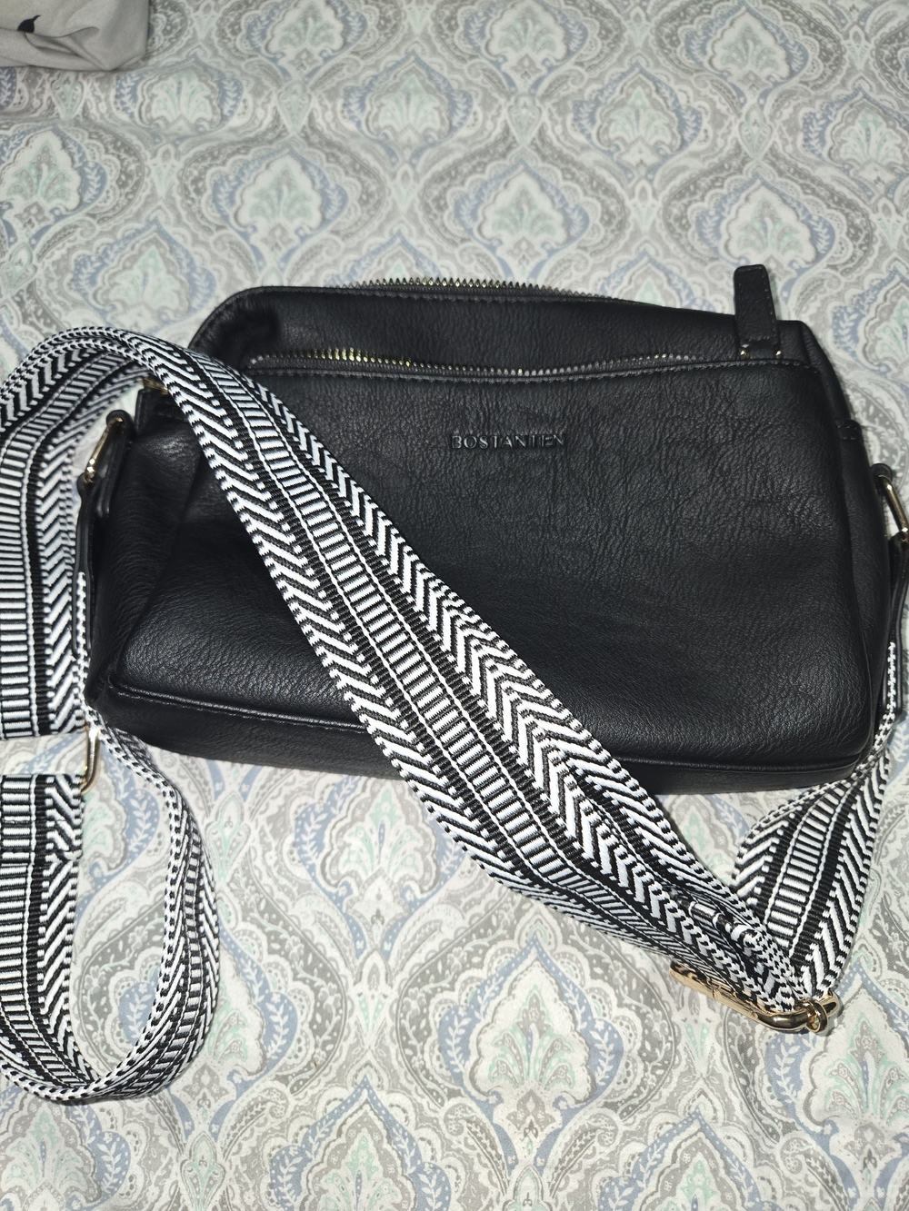 Black Leather Crossbody Bag with Patterned Strap